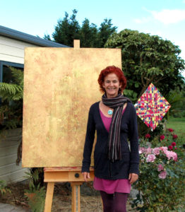 artist with her work "transition"