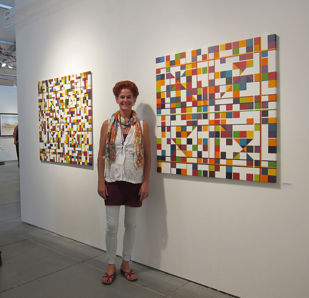 about-the-artist-ruth-at-scope-basel women standing in front of her artwork at a gallery