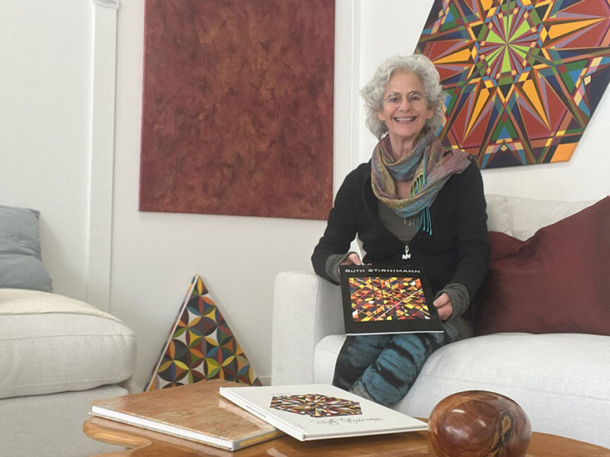 about-the-artist-internationally-recognized woman sitting with her featured works