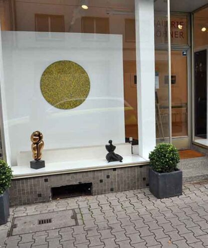international-publications-mannheim-2015 abstract art hanging in storefront window